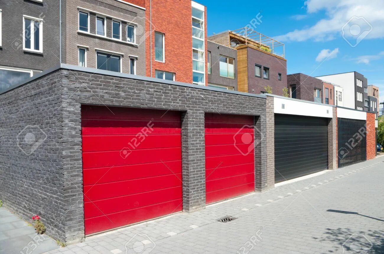 Garage красная ул 78 фото red garage doors belonging to a row newly built modern houses Red garage door, M