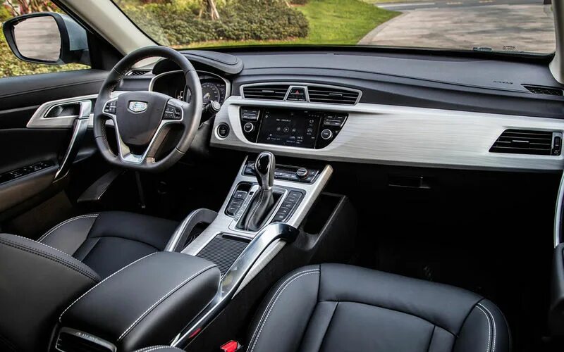 Geely atlas 2024 салон фото Обзор Geely Atlas 1.8 c турбомотором - технические характеристики и фото 2018-20