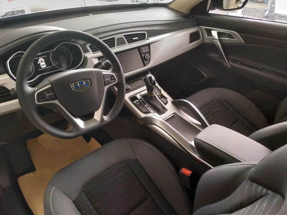 Geely atlas фото салона Купить новый Geely Atlas I 2.4 AT (149 л.с.) бензин автомат в Вологде: чёрный Дж