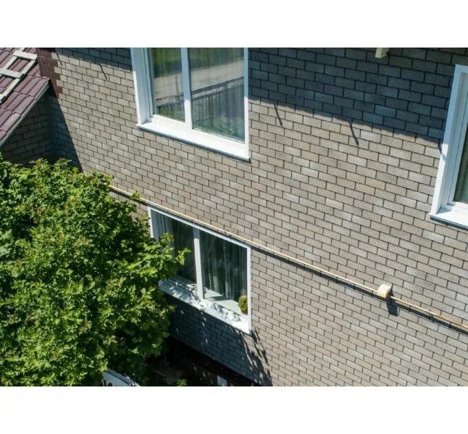 Hauberk готический кирпич фото Купить Фасадная плитка Технониколь Хауберк серо-бежевый кирпич (2м²), по цене 66