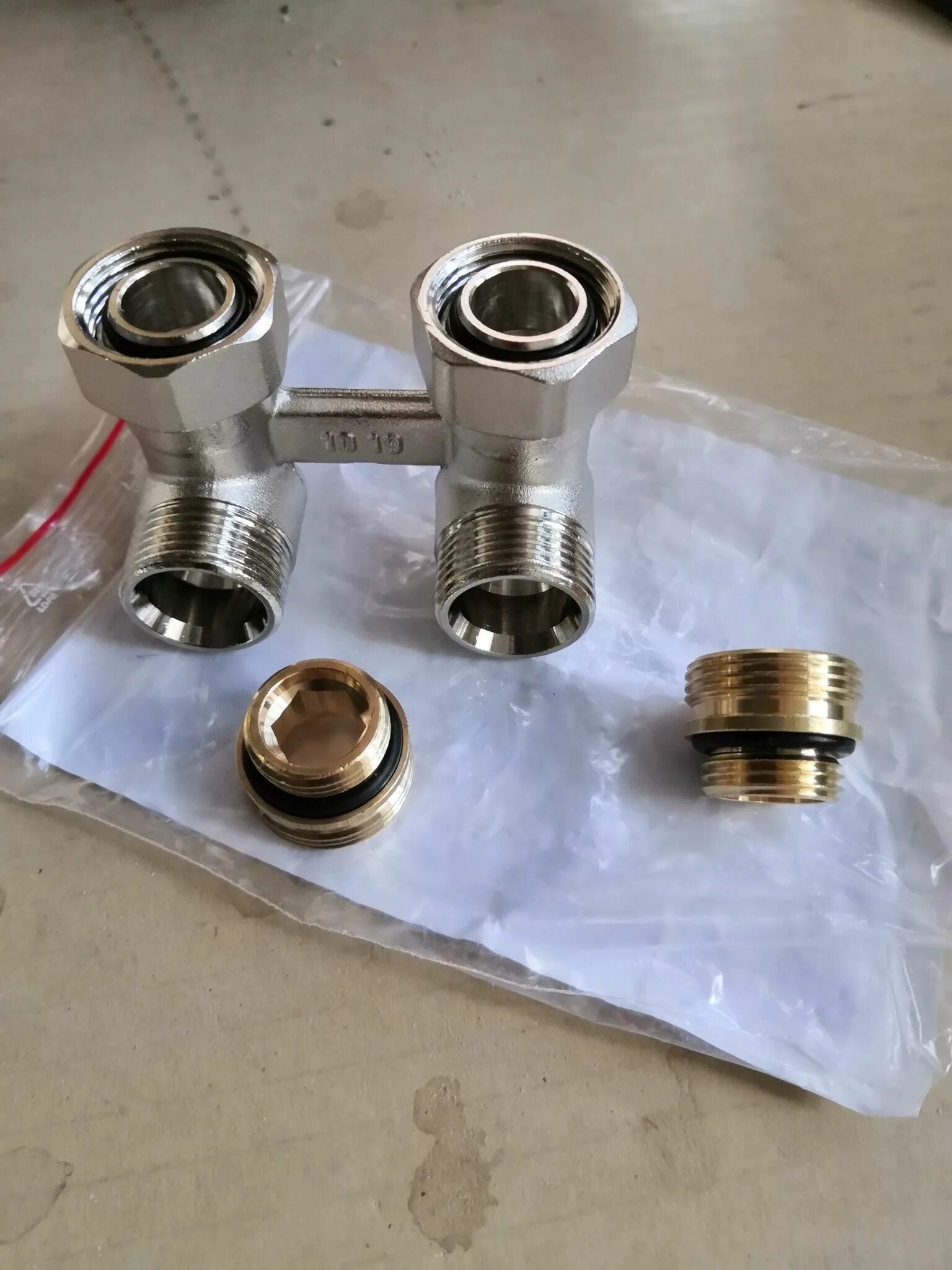 Rehau узел подключения радиатора Узел нижнего подключения Rehau RAUTITAN G 1/2xG 3/4 угловой 12407371001 - купить