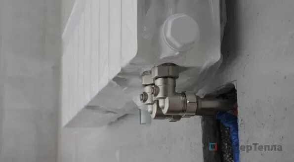 Sanext нижнее подключение радиатора Блок шаровых кранов угловой Rehau G1/2-G3/4" (12407371001) купить в интернет маг