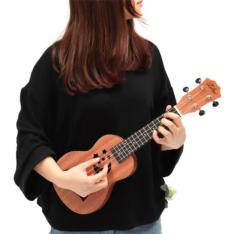Акулель инструмент музыкальный фото Zebra 21" Sapele Star Pattern Ukulele 4 Nylon Strings Hawaii Mini Guitar Uke Fin