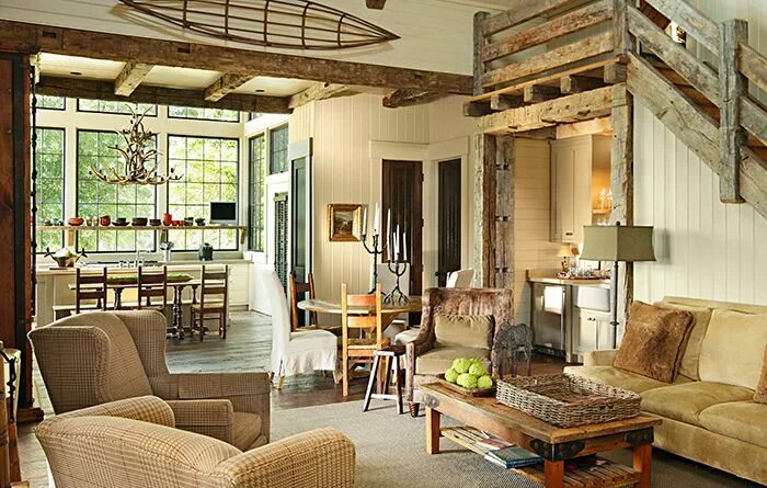 Кантри современный стиль интерьера Lake Living: A Southern Architect's Take - Mountain Living Rustic living room de