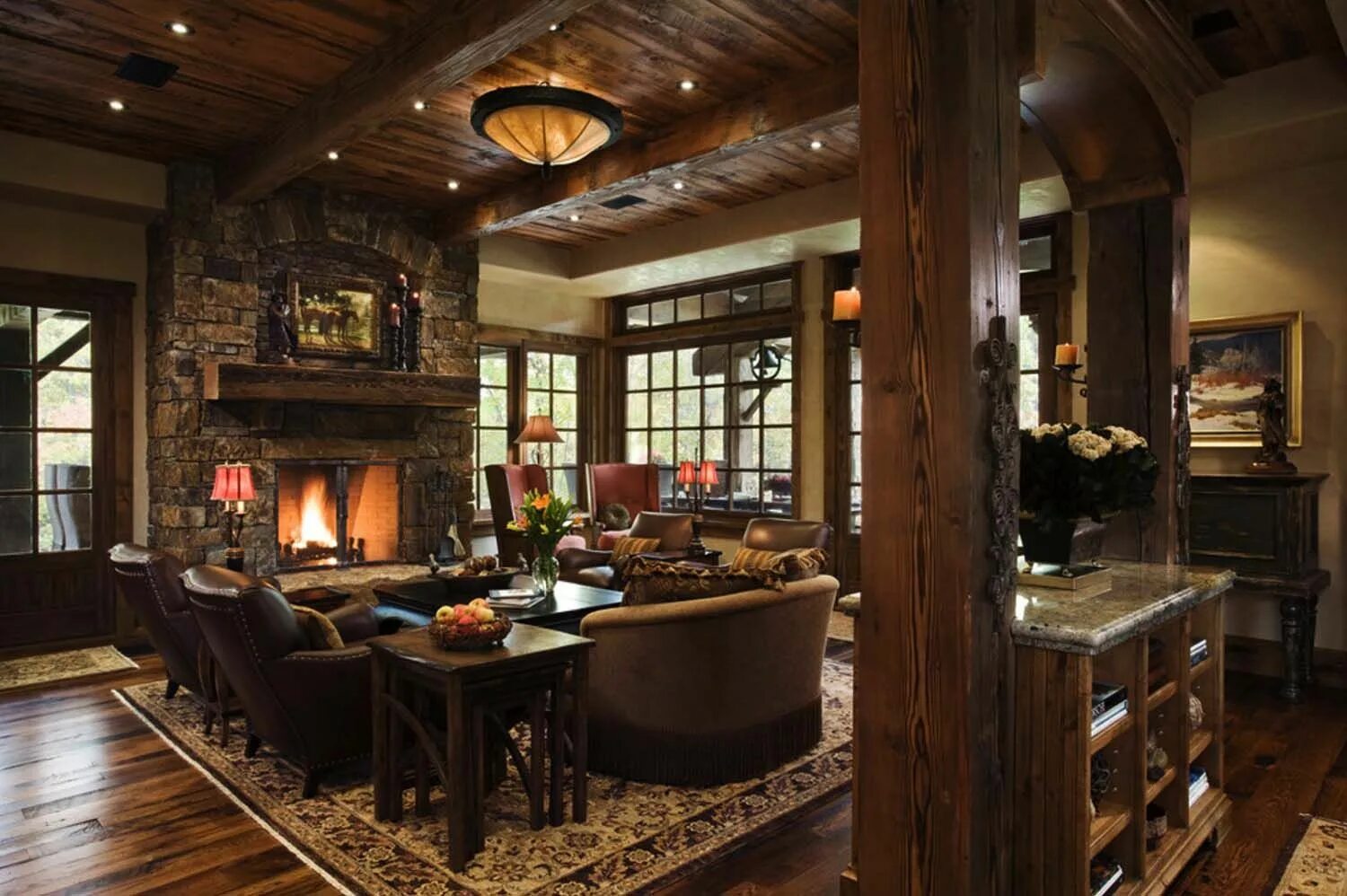 Кантри в интерьере загородного дома фото Striking rustic stone and timber dwelling in Ontario, Canada Rustic living room,