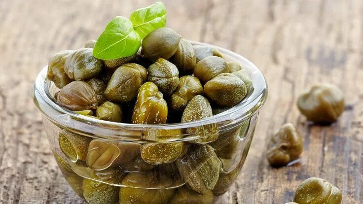 Каперсы что это такое фото где растут Caper sauce adds piquant touch to savory food Alcaparras, Nutrición, Recetas de 