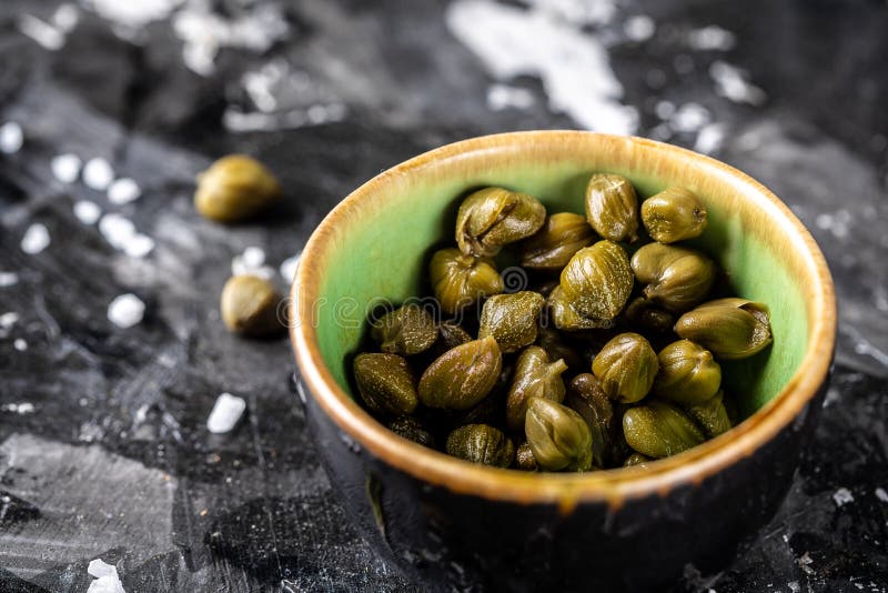 Каперсы что это такое фото цена Marinated Capers in a Woden Bowl. Edible Flower Buds of Capparis Spinosa, Caper 