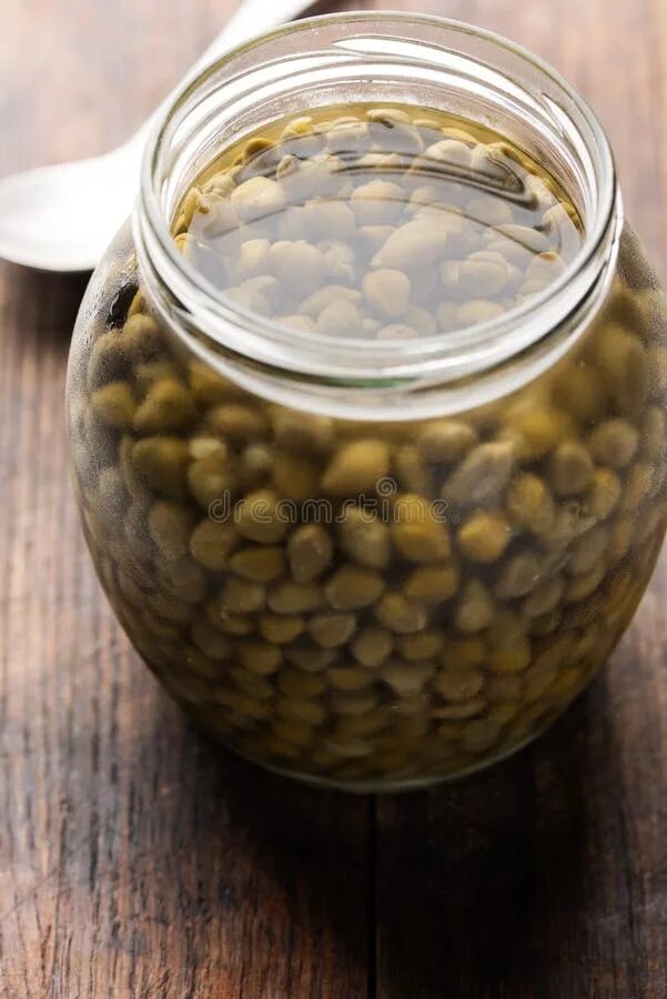 Каперсы в банке фото Capers in Glass Jar on Wood Stock Photo - Image of pickle, vegetarian: 38691934