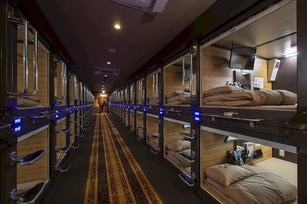 Капсульный вокзал фото Capsule Hotel Anshin Oyado Premier Tokyo Shinjuku Station in Tokyo Hostels desig