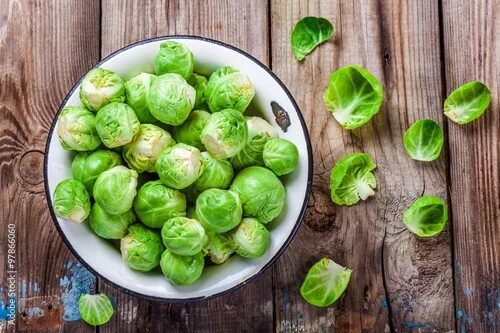 Капуста маленькие кочанчики как называется фото Fresh organic Brussels sprouts in a bowl фотография Stock Adobe Stock