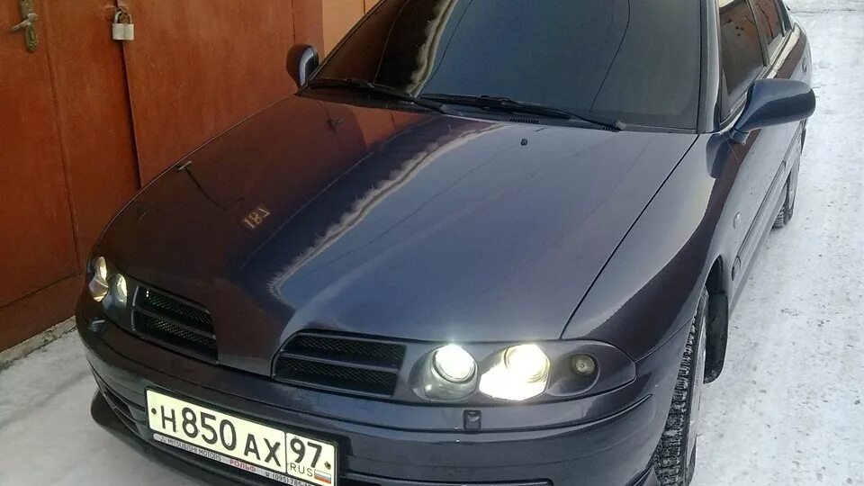 Каризма тюнинг фары Mitsubishi Carisma 2.5 бензиновый 2002 Elegance на DRIVE2