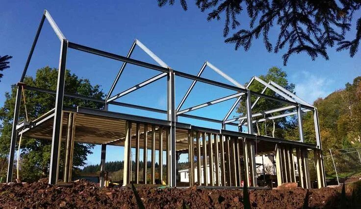 Каркасный дом из металла проекты фото Erecting the steel frame Steel frame house, Barn house design, Building a house