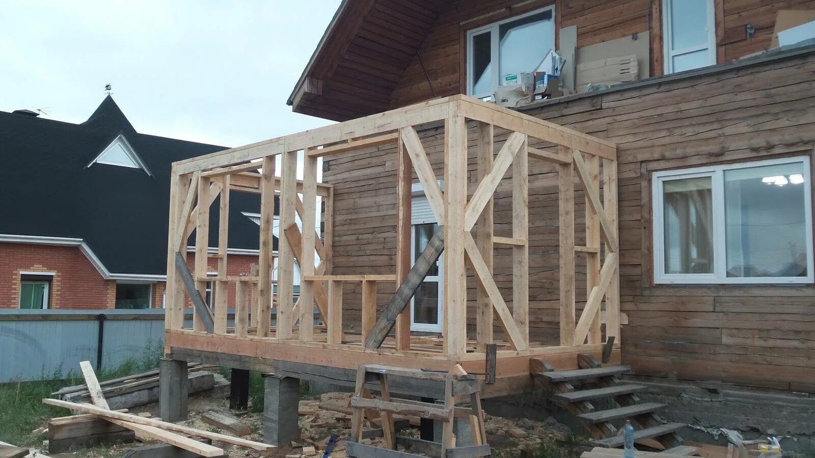 Каркасный пристрой к деревянному дому фото Пристройка к дому: технология строительства своими руками