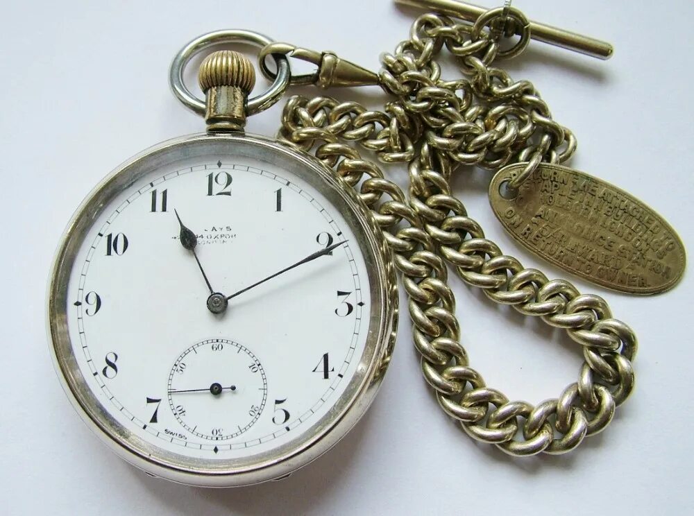 Карманные часы цены фото An Antique Omega Pocket Watch With Chain