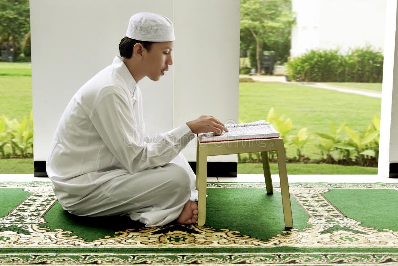 Котик читает коран фото Muslim Man Reading the Quran on His Hands Stock Photo - Image of prayer, holding