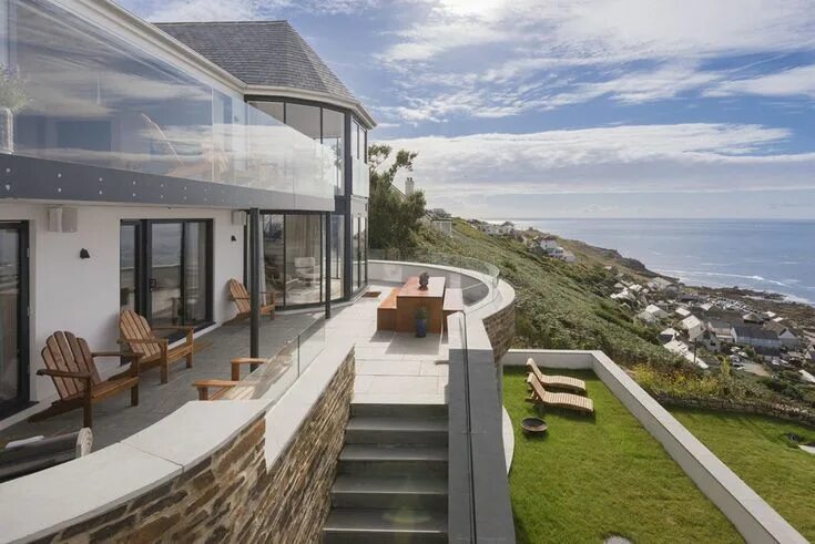 Коттеджи у моря фото Belle maison - location de vacances à Cornwall avec vue imprenable sur la mer St