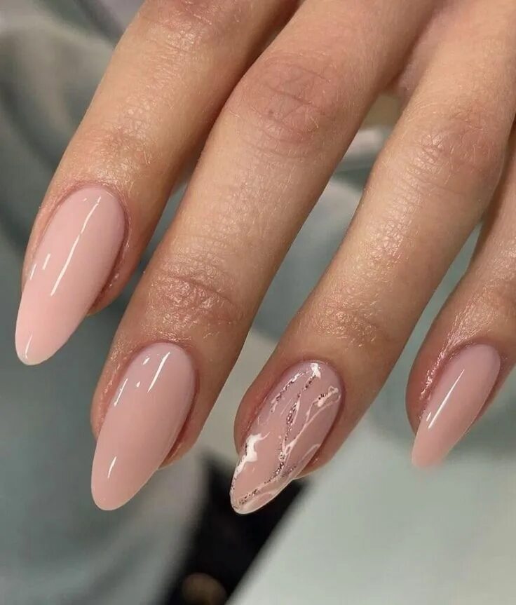 Красивый маникюр 2024 на длинные ногти миндаль Almond-Shaped Nude Nails with Glitter Accent The KA Edit