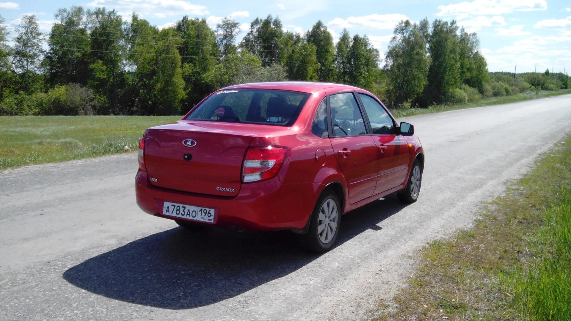 Красная гранта фото Lada Гранта 9.9 бензиновый 2013 Люкс, +7-21905-42-018 на DRIVE2