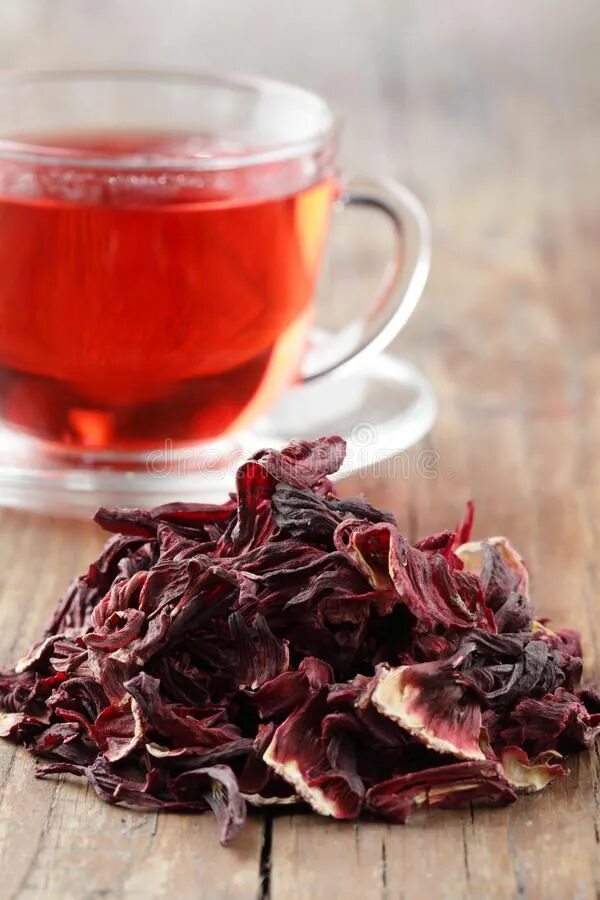 Красный чай ул поляны 5 фото Hibiscus tea. Heap of dried hibiscus calyces against a cup of hibiscus tea , #AF