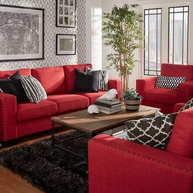 Красный диван в интерьере гостиной Inspire Q on Instagram: "Bold red couches! What a statement! #redcouch #statemen