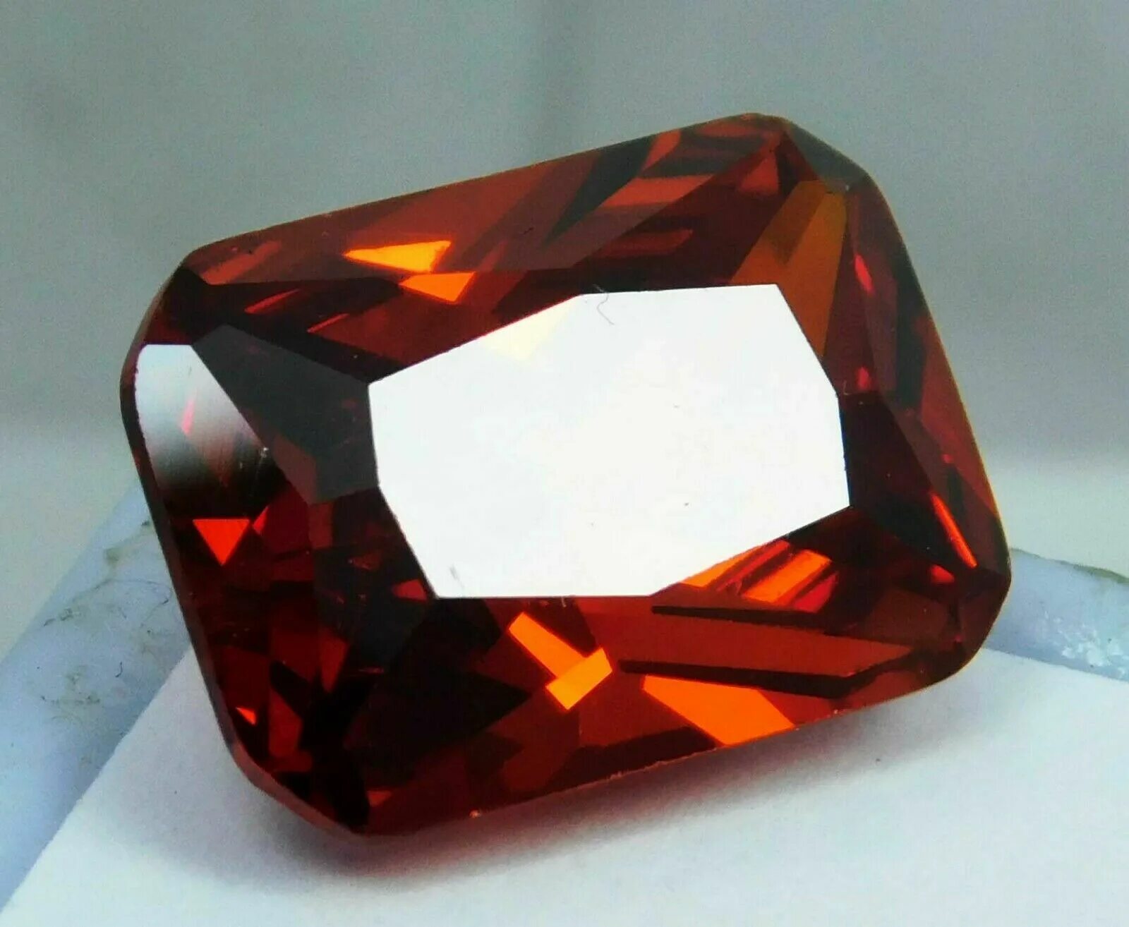 Красный циркон фото Купить Циркон Radhey 11.95ct. 100% Natural Emerald Cut Cambodian Red Zircon Loos
