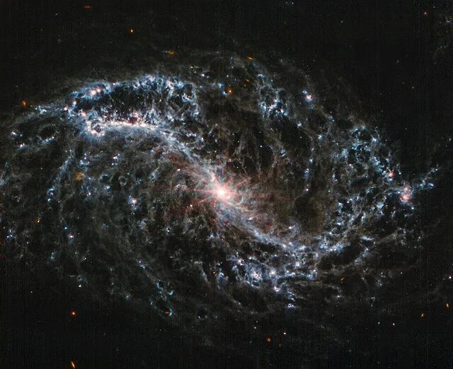 Край вселенной фото Файл:JWST Dust NGC7496 II.jpg - Википедия
