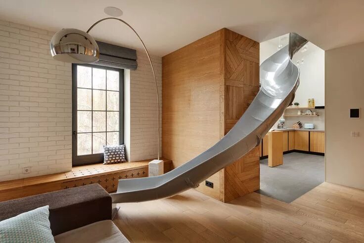 Креативный дизайн интерьера This apartment interior was designed with a slide into the living room Apartment