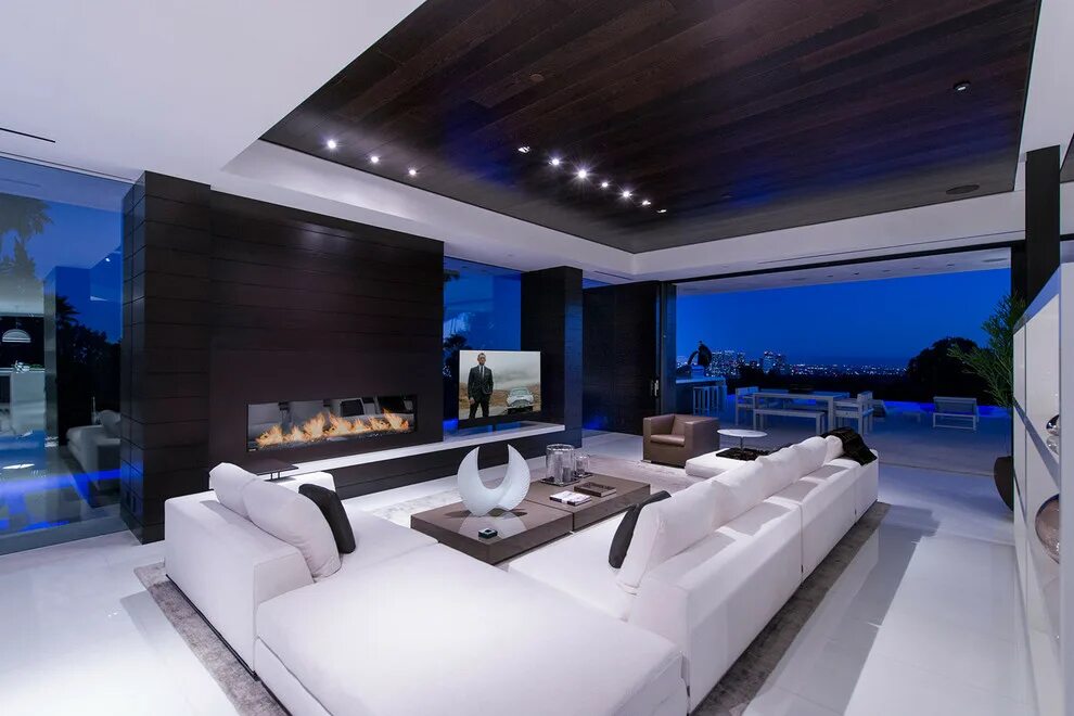 Крутой зал фото Laurel Way Beverly Hills luxury home modern living room with sliding glass walls