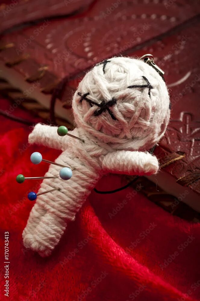 Кукла вуду пранк фото Witchcraft and place a jinx or put a spell on someone concept with a voodoo doll