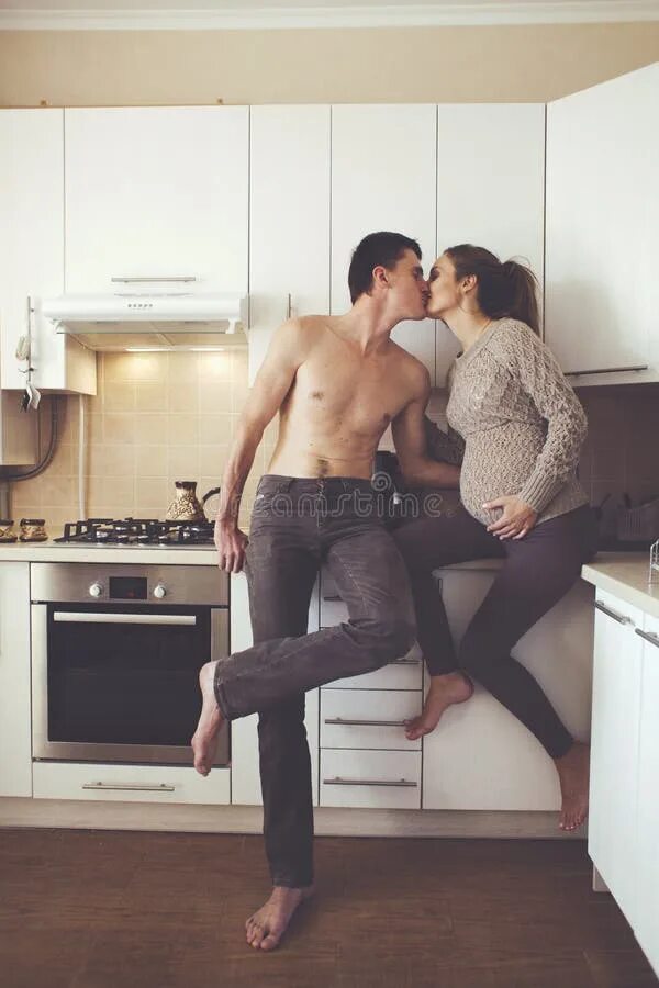 Куни на кухонном столе фото Couple stock image. Image of girl, husband, cooking, lifestyle - 45526523
