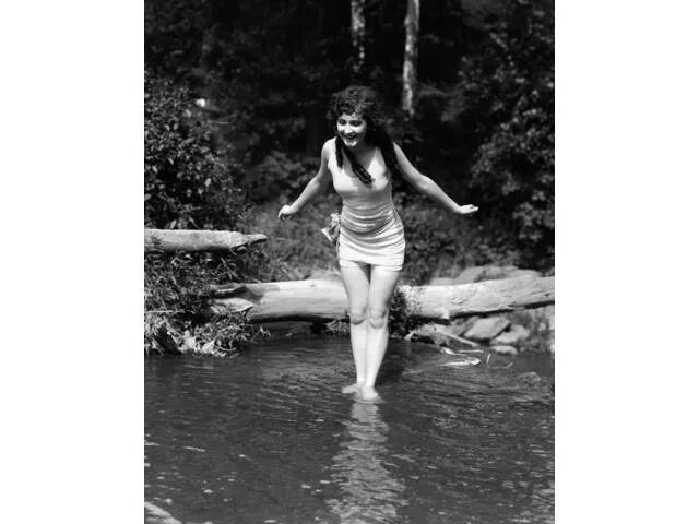 Купание ретро фото 1920s Long-Haired Woman In Old Fashion Bathing Suit Standing In Pond With Feet I