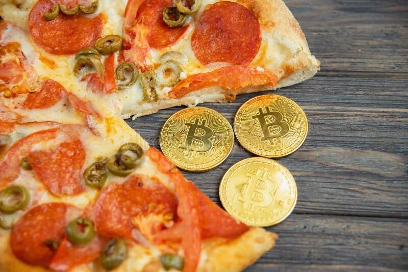 Купил пиццу за 10000 биткоинов фото Bitcoin Pizza Day 22 May. Cryptocommunity Holiday. Concept of Buying Pizza with 