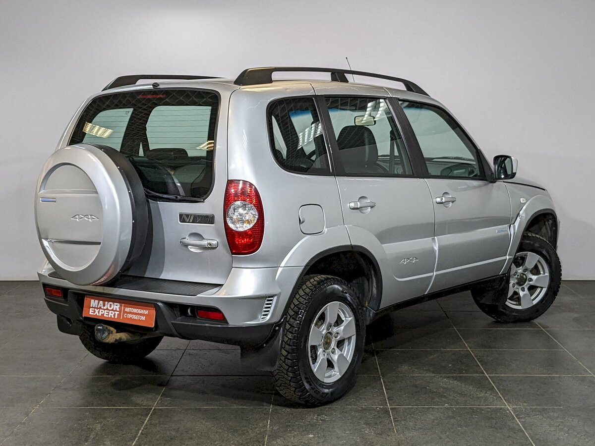 Купить нива шевроле фото новая Купить б/у Chevrolet Niva I Рестайлинг 1.7 MT (80 л.с.) 4WD бензин механика в Мо