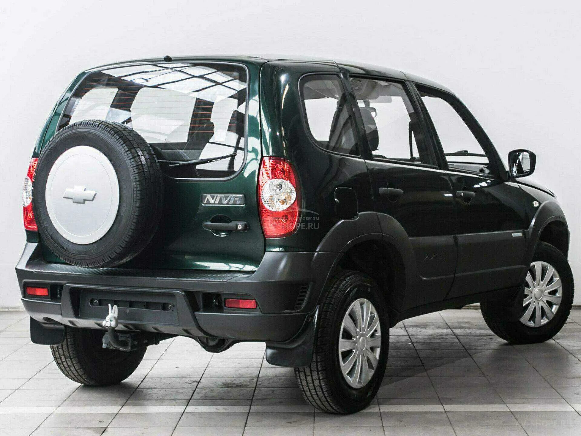 Купить ниву шевроле новую фото цена Купить Chevrolet Niva 1.7i MT (80 л.с.) 2015 года, с пробегом в кредит Шевроле Н