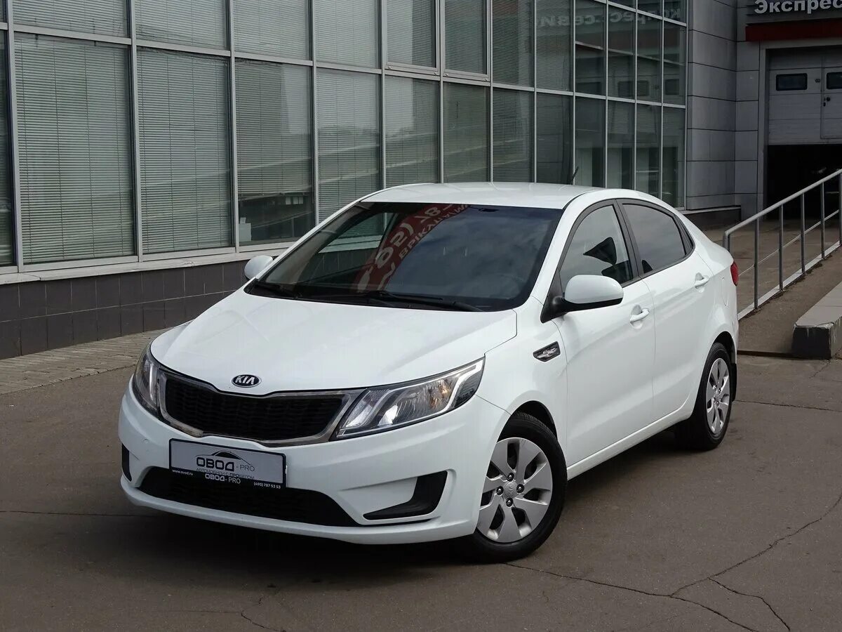 Купить новый киа рио цена фото Купить б/у Kia Rio III 1.4 AT (107 л.с.) бензин автомат в Москве: белый Киа Рио 