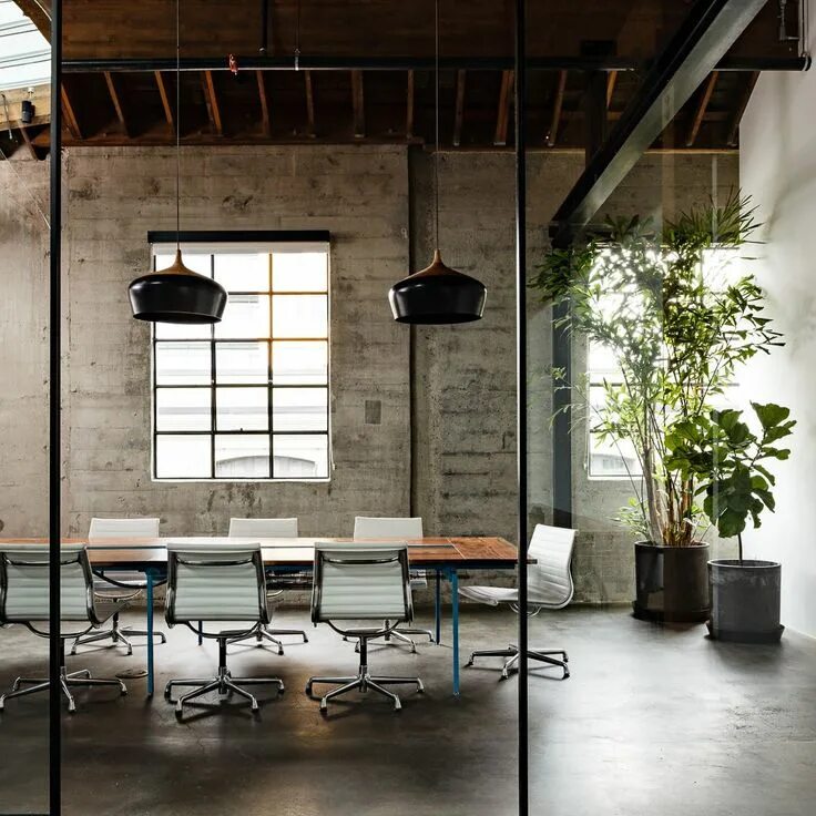 Купить офис в стиле лофт A beautiful office conference space design furnished with Eames Aluminum Group C