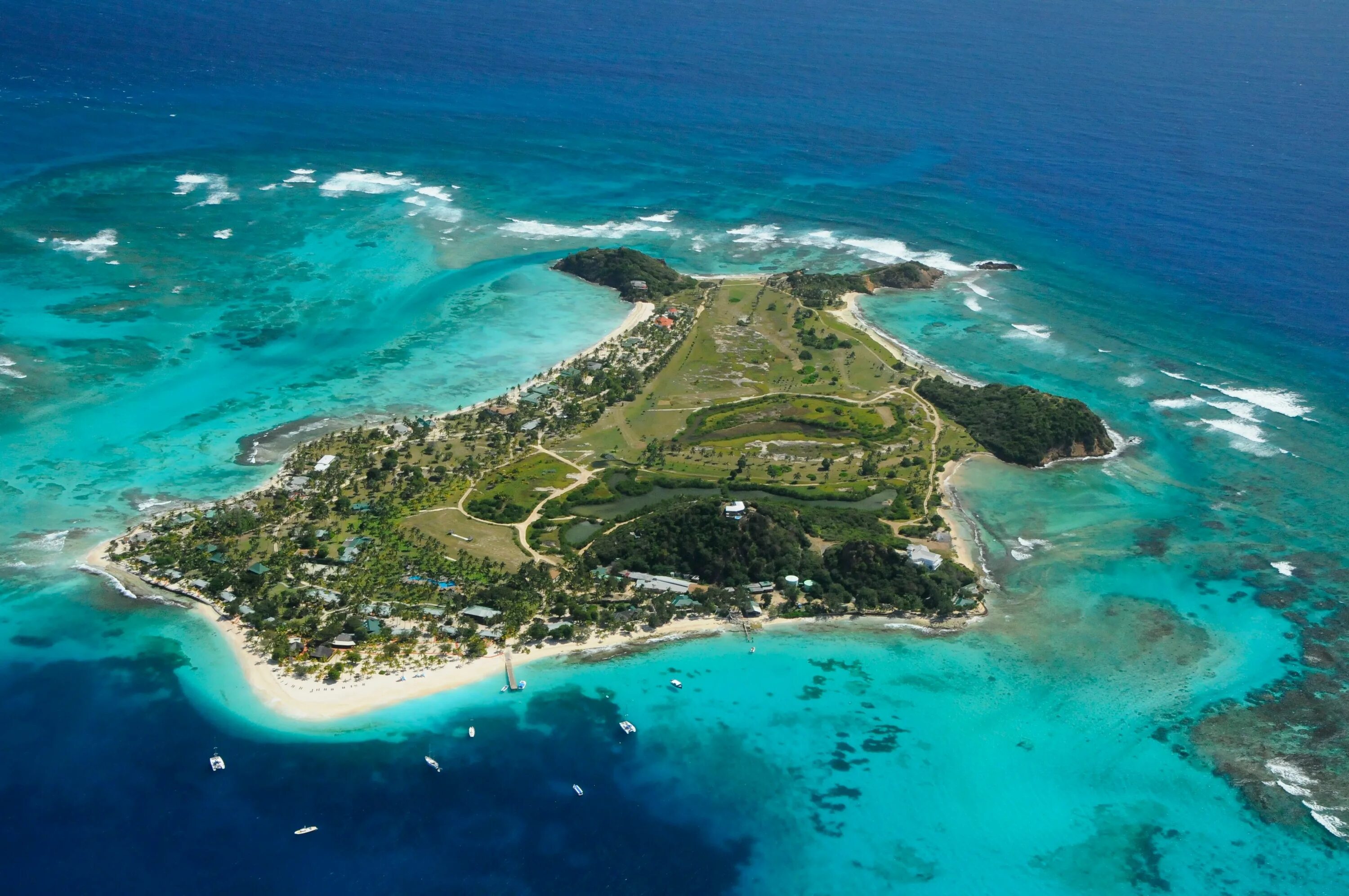 Купить остров на карибах цены с фото Aerial view of Palm Island in St Vincent and the Grenadines. http://www.discover