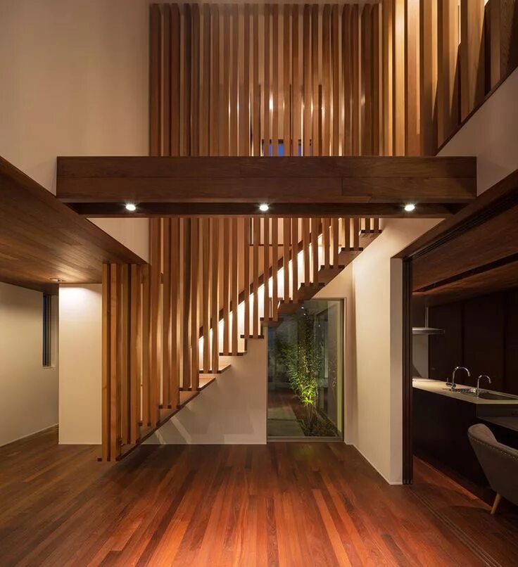 Лестница отделка деревом фото Suspended Wooden Staircase Floats on Air - Captivatist Escaleras para casas pequ