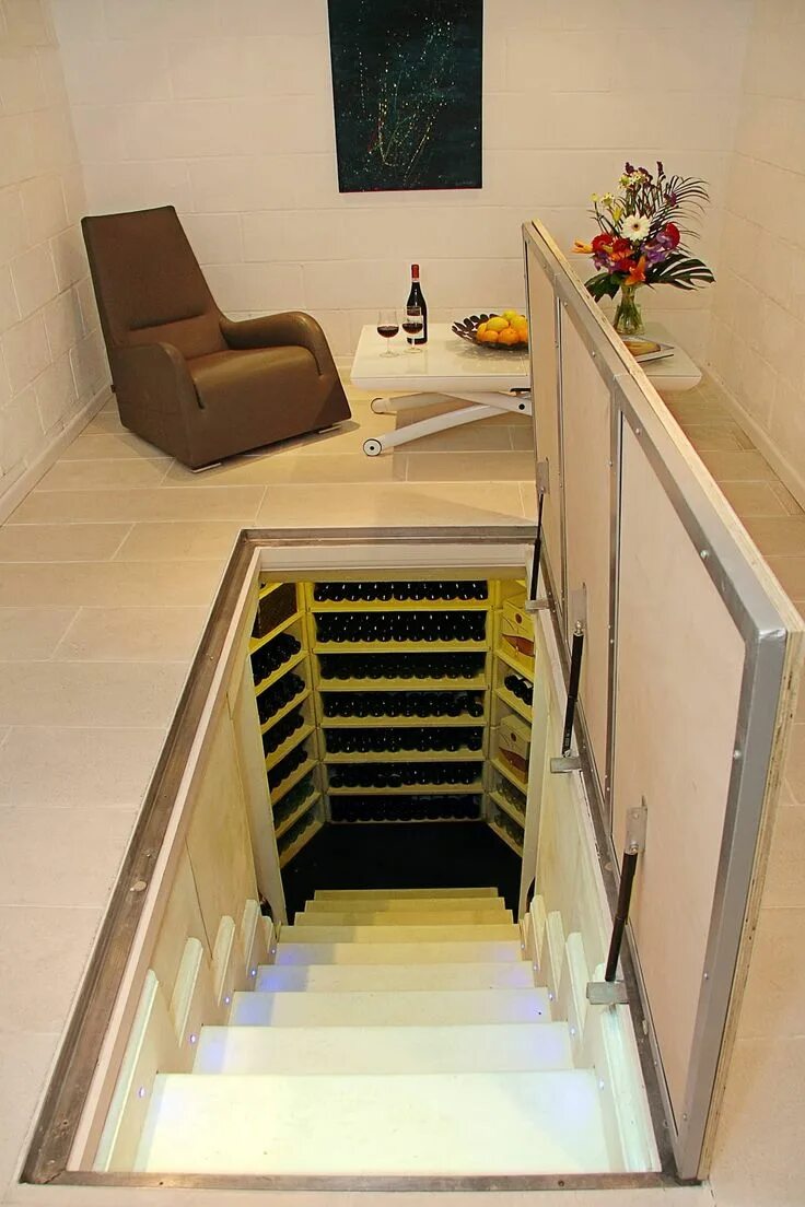 Лестница в подвал фото The large hexagonal cellar, stone cellar company homify Habitaciones ocultas en 