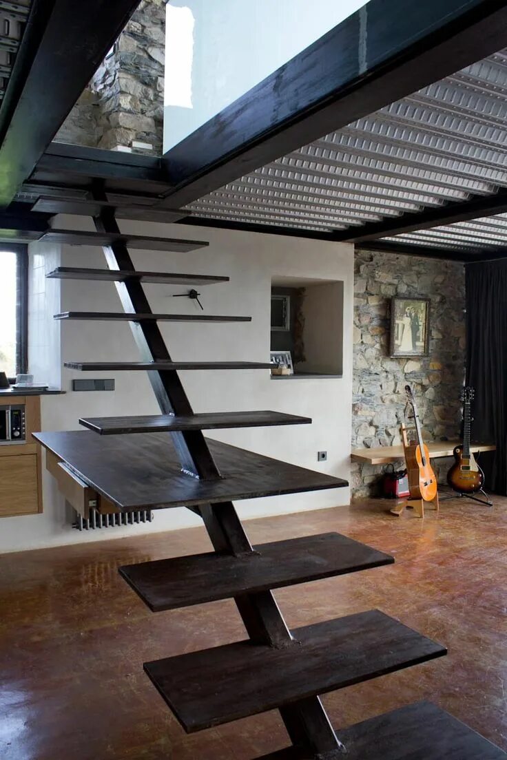 Лестница в стиле лофт в частном доме Hausrenovierung der besonderen art, tagarro-de miguel arquitectos homify Stairs 