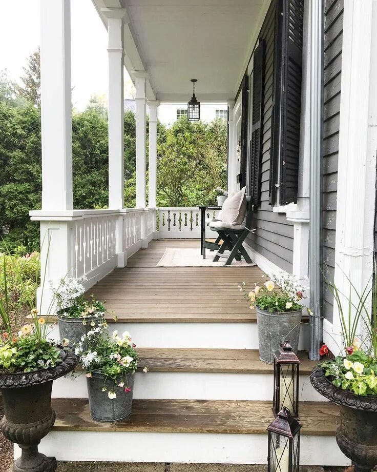 Лестница веранды фото Beautiful wood porch with white railings gray siding and black shutters on this 