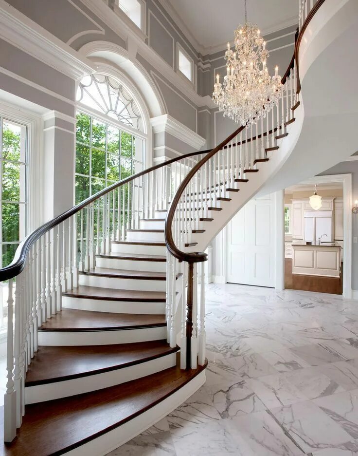 Лестницы фото ростов An Elegant Entry for a Midwestern Heirloom House - Traditional - Staircase - Mil