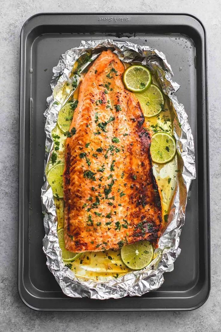 Лосось запеченный в духовке фото Baked honey cilantro lime salmon in foil is cooked to tender, flaky perfection i