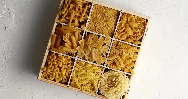 Макароны в коробке фото Box Filled with Assorted Macaroni Stock Image - Image of traditional, design: 12