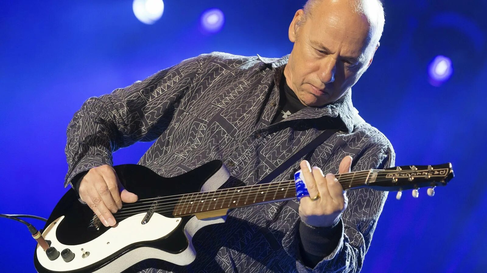 Марк кнопфлер фото Mark Knopfler Plots Summer North American Tour