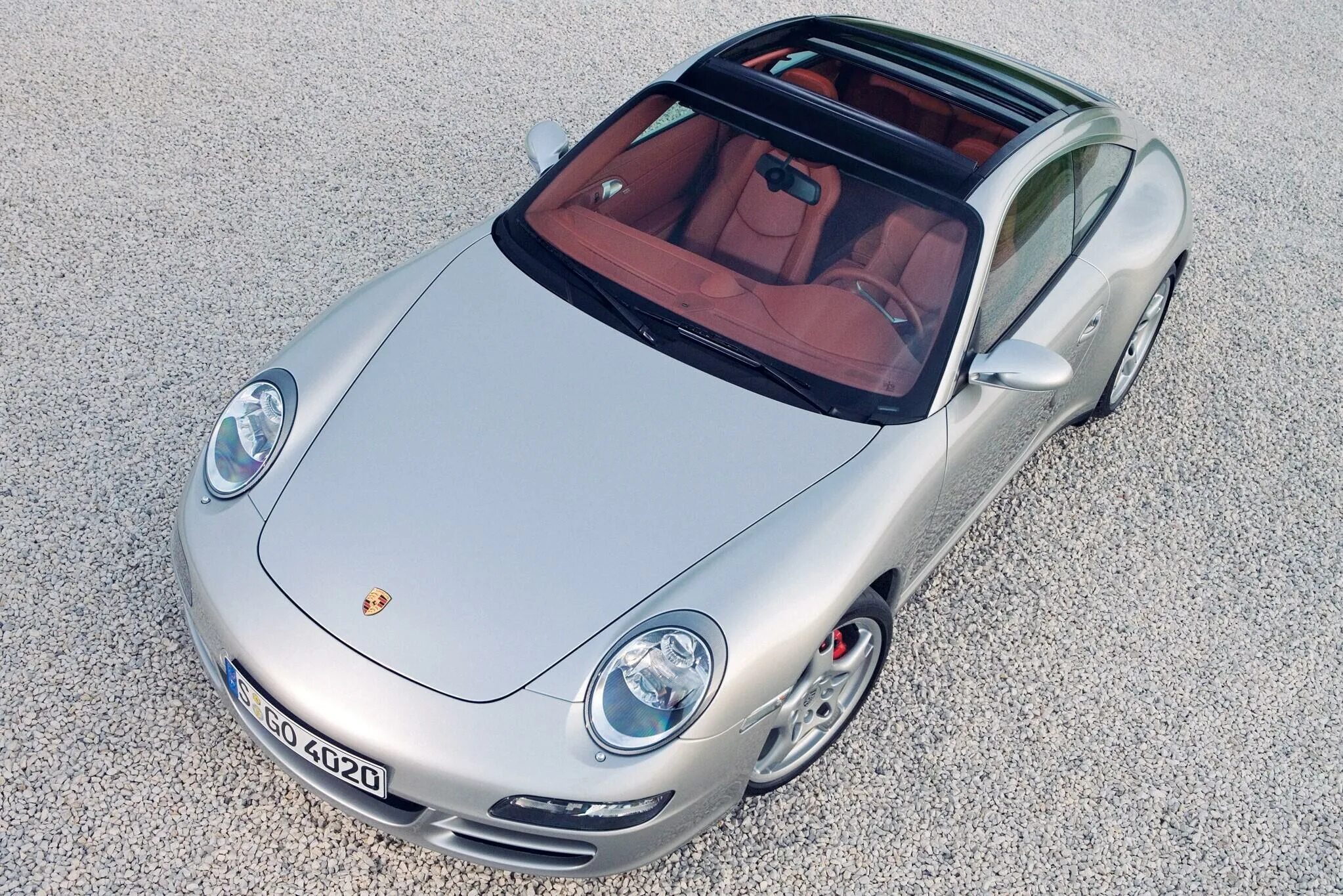 Марка порше фото Porsche 911 997 (2004 - 2008) Родстер 4 3.6 MT (325 л.с.) - технические характер
