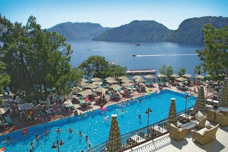 Мармарис турция фото отелей 5 звезд A Beach Hotel Pool in Marmaris Turkey Turkey travel guide, Turkey travel, Turkey