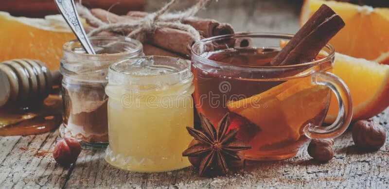 Мед зима фото Winter Tea with Orange, Honey and Cinnamon in a Glass Cup on the Stock Photo - I