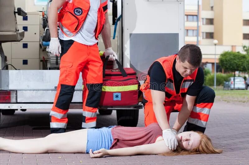 Медицинская помощь фото Paramedics Applying First Aid Stock Photo - Image of clear, patient: 44861462