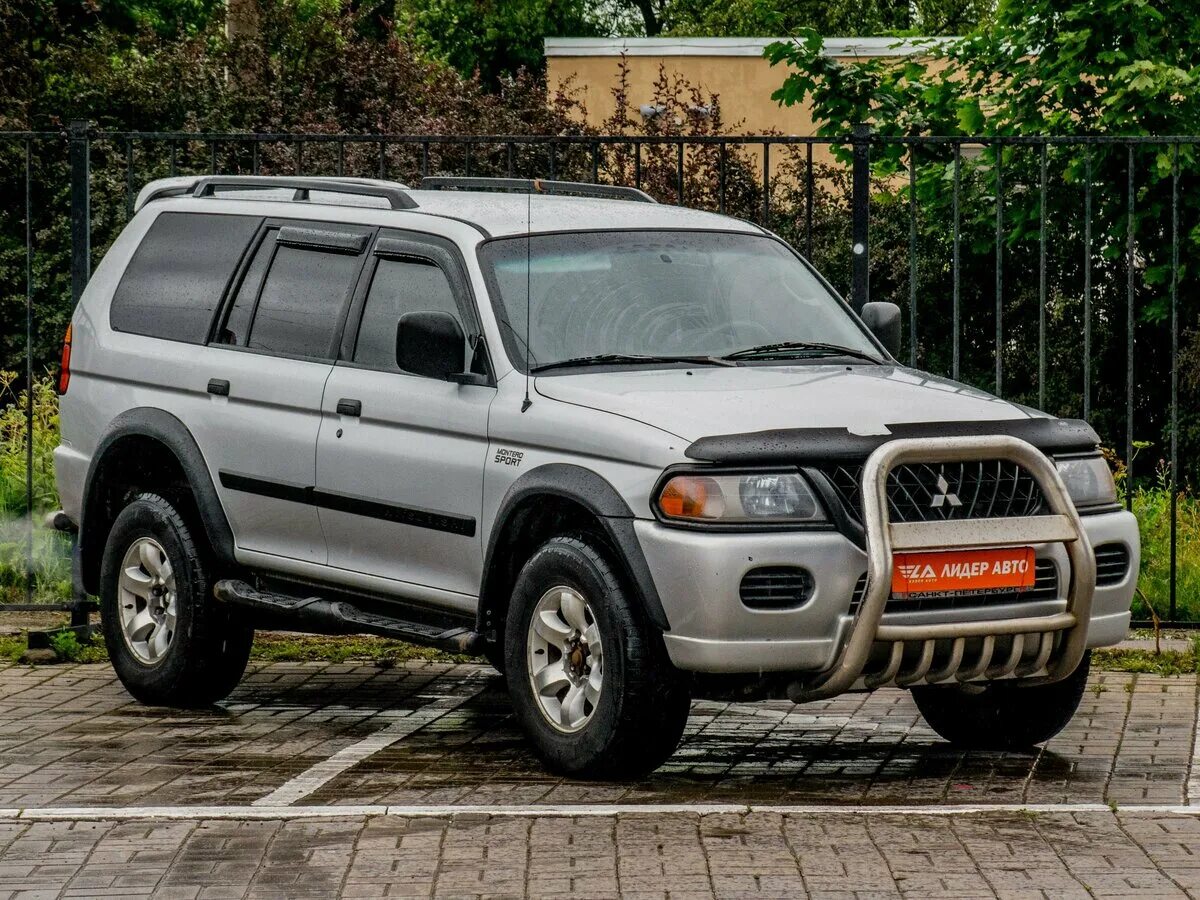 Мицубиси монтеро спорт фото Купить б/у Mitsubishi Montero Sport I 3.0 AT (177 л.с.) 4WD бензин автомат в Сан